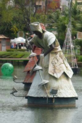 Statue of Oxalá, foremost of the Candomblé dieties - syncretically associated with St. Augustine. Click for full size. Statue of Oxalá, foremost of the Candomblé dieties - syncretically associated with St. Augustine image. Click for full size.