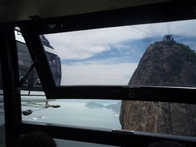 Cars pass each other below Sugar Loaf image. Click for full size.