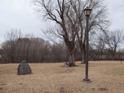 Historical marker (base of tree) and an additional marker in the area (left in photo). Click for full size. Historical marker (base of tree) and an additional marker in the area (left in photo) image. Click for full size.