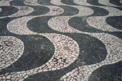 Praça São Sebastião: inlaid pavement decorated in the "Meeting of the Rivers" pattern. Click for full size. Praça São Sebastião: inlaid pavement decorated in the "Meeting of the Rivers" pattern image. Click for full size.
