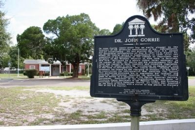 John Gorrie State Museum in the background of the Dr. John Gorrie Marker image. Click for full size.