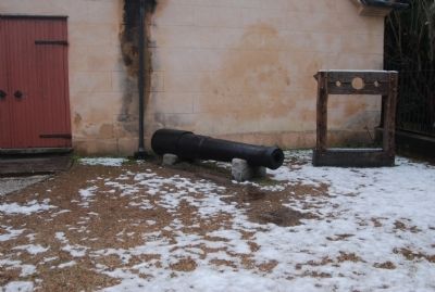 Pillory and old cannon. Click for full size. Pillory and old cannon image. Click for full size.