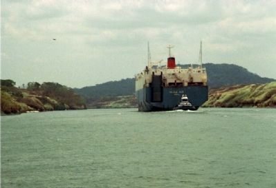 Southbound view of Gaillard Cut with a container ship transiting the canal. image. Click for full size.