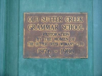 Plaque Mounted on the Green Front Door of Schoolhouse image. Click for full size.