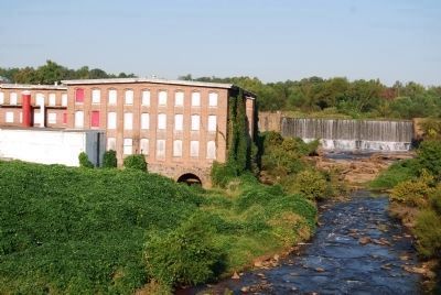 Reedy River Factory and Lake Conestee Dam. Click for more information. Reedy River Factory and Lake Conestee Dam image. Click for more information.