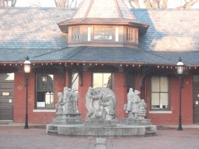 Historic Depot and Granite Statues Depicting Railroad Scenes image. Click for full size.