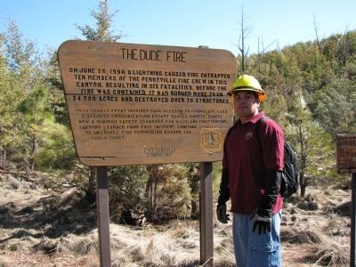 The Dude Fire Marker With West-Facing Slope of Walk Moore Canyon in Background image. Click for full size.