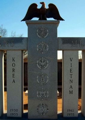Greenville County Veterans Memorial -<br>Center Column Showing Military Seals. Click for full size. Greenville County Veterans Memorial -<br>Center Column Showing Military Seals image. Click for full size.
