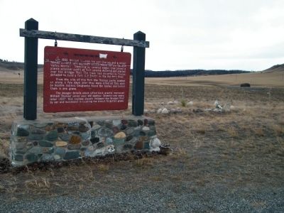 The Thomas Party Marker with gravesite in background image. Click for full size.