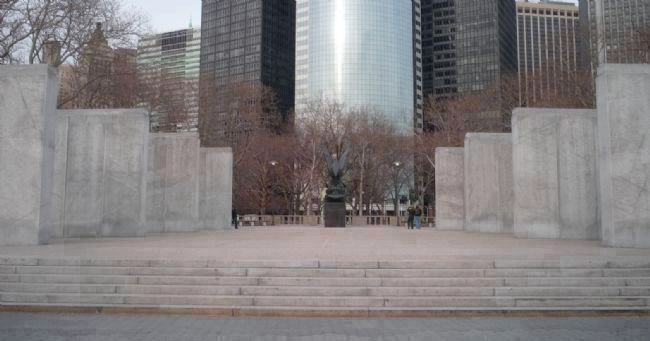East Coast Memorial: the eagle statue and eight pylon tablets with the names of those lost in WWII. Click for full size. East Coast Memorial: the eagle statue and eight pylon tablets with the names of those lost in WWII image. Click for full size.