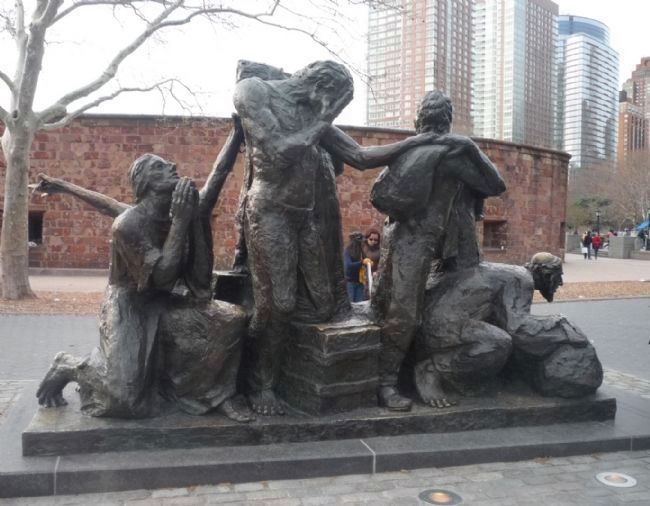 The Immigrants Memorial - view from east with Castle Clinton in background image. Click for full size.
