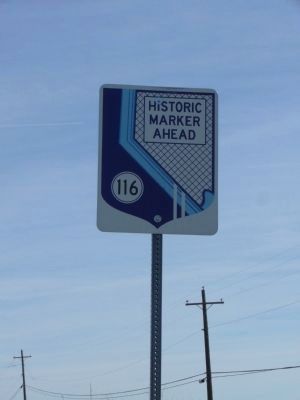 Searchlight Marker Sign on Highway image. Click for full size.