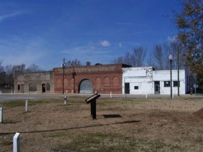 The Mayesville Story Marker with Historic Commercial stores in background image. Click for full size.