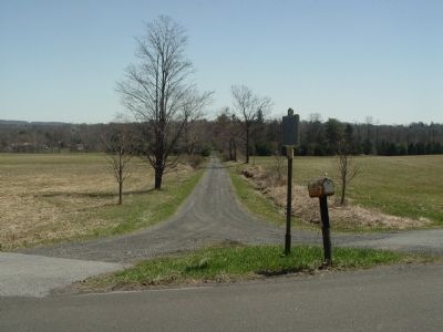 Riverside Farm driveway with marker in foreground. image. Click for full size.