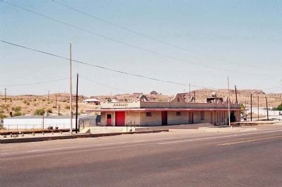 Atchison, Topeka & Santa Fe Railroad Depot, looking west on Andy Devine Avenue. Click for full size. Atchison, Topeka & Santa Fe Railroad Depot, looking west on Andy Devine Avenue image. Click for full size.