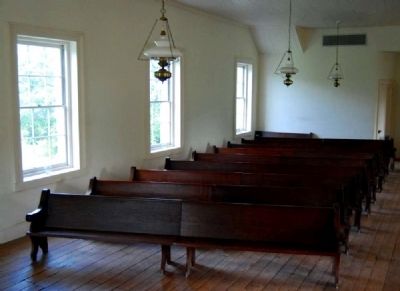 Row of Wooden Pews in Second Story Chapel image. Click for full size.