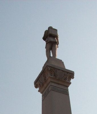 Obverse Left View - - Top Statue image. Click for full size.