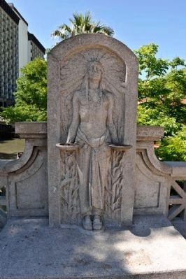 Statue of Indian Holding Two Bowls on Bridge image. Click for full size.