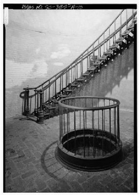 Hunting Island Light Station Interior, lamp mechanism weight pit, stairway image. Click for full size.