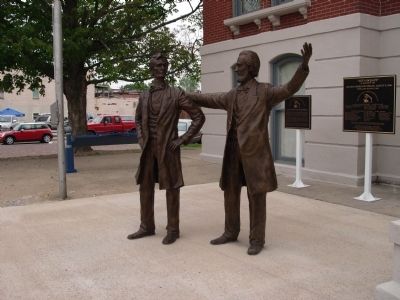 " Let's Debate " Statues image. Click for full size.