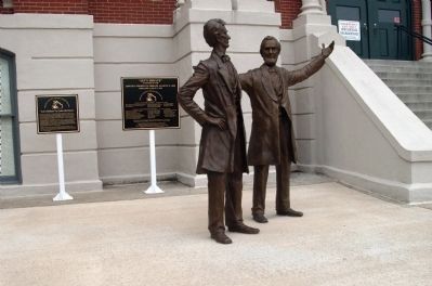 " Let's Debate " Statues image. Click for full size.