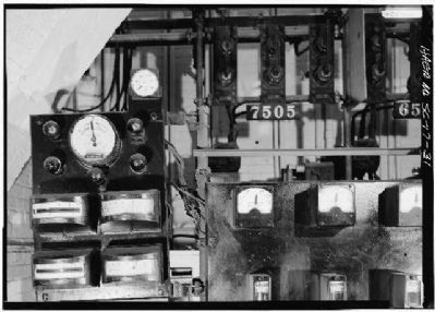 1896 Power Plant ,synchroscope and gauges, interlock disconnection switches on control panel image. Click for full size.