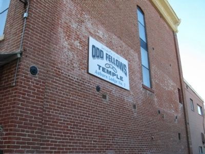 Sign Mounted on East Side of Building image. Click for full size.