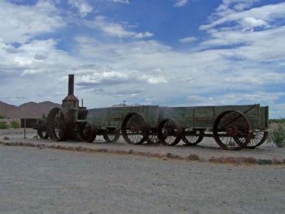 Old Dinah steam tractor and ore wagons image. Click for full size.