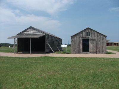 The Camp Marker and Replica Buildings image. Click for full size.