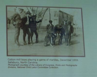 Cotton mill boys playing a game of marbles image. Click for full size.