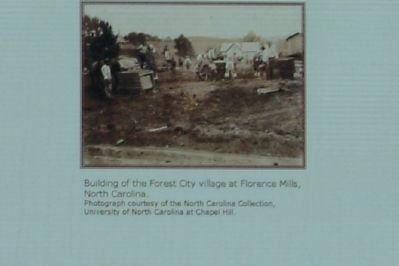Building of the Forest City village at Florence Mills, North Carolina. image. Click for full size.