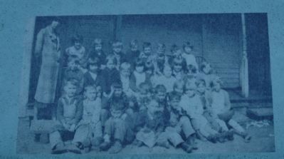 Children at the original clapboard Glencoe School. image. Click for full size.