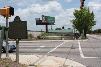The Augusta Canal Marker, seen looking back east along Walton Way at 13th Street (US 1), foreground image. Click for full size.