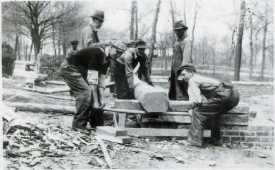 Working on the Scout Cabin Log Walls. Click for full size. Working on the Scout Cabin Log Walls image. Click for full size.