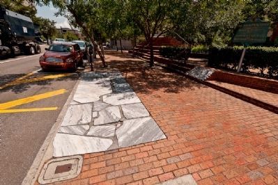 These marble stones are the remnants of Archie Ross' historic sidewalk image. Click for full size.