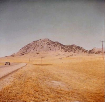Bear Butte , Sacred Sioux mountain as seen from State Road 79. Click for full size. Bear Butte , Sacred Sioux mountain as seen from State Road 79 image. Click for full size.