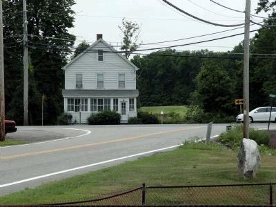 Looking Over the Spring and Tablet to the Butter Factory Marker at Far Side of Intersection.. Click for full size. Looking Over the Spring and Tablet to the Butter Factory Marker at Far Side of Intersection. image. Click for full size.