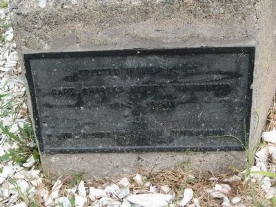 Marker at the Base of a Flagpole. Click for full size. Marker at the Base of a Flagpole image. Click for full size.