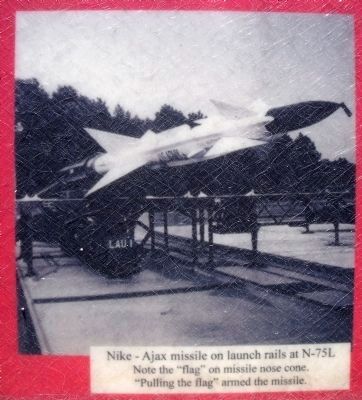 Nike–Ajax missile on launch rails at N-75L. Click for full size. Nike–Ajax missile on launch rails at N-75L image. Click for full size.
