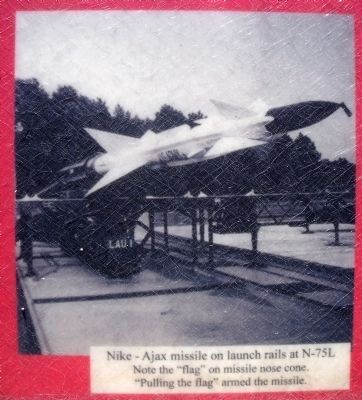 Nike–Ajax missile on launch rails at N-75L image. Click for full size.