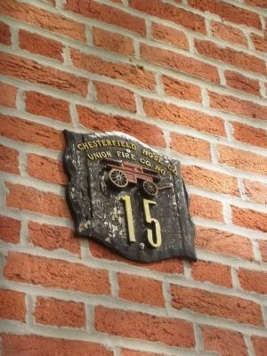 Fire insurance house marker on First Day school/gathering place. Click for full size. Fire insurance house marker on First Day school/gathering place image. Click for full size.