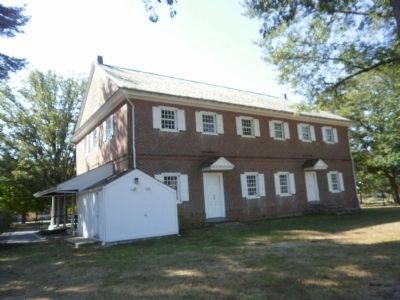 Rear (north) view of Crosswicks Friends Meeting House - cannon ball over door on the right. Click for full size. Rear (north) view of Crosswicks Friends Meeting House - cannon ball over door on the right image. Click for full size.
