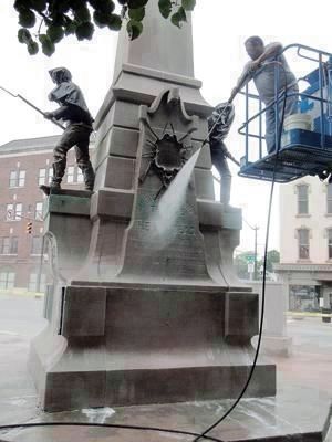 "Local Company Cleans War Memorial" image. Click for full size.