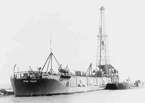 First Offshore Oil Well being drilled af Rig 15 in 1947 image. Click for full size.