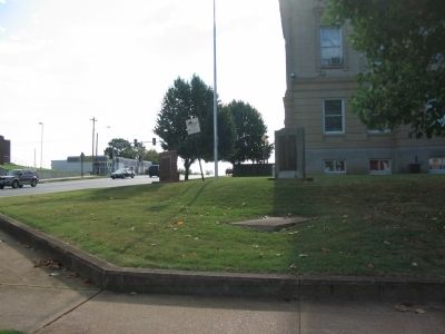 Memorials in front of the Courthouse image. Click for full size.