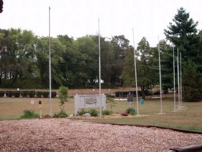 The Eight Flag Poles - - image. Click for full size.
