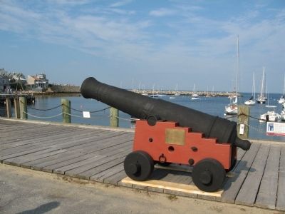 Cannon from the U.S.S. Constitution Overlooking Rockport Harbor image. Click for full size.
