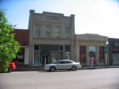 Markers in front of the Coston Building and the Old Post Office. Click for full size. Markers in front of the Coston Building and the Old Post Office image. Click for full size.