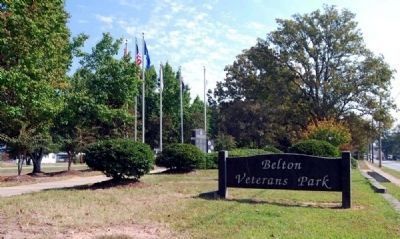 Belton Veterans Park -<br>Dedication Plaque at Base of Sign Reads image. Click for full size.