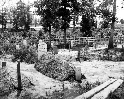 Soldier's cemetery. Grave of Sgt. Frank L. Smith, Co F, 1st Conn. Heavy Artillery in foreground. image. Click for full size.